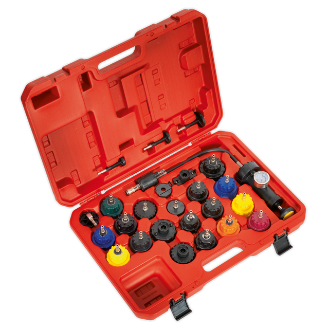 The Sealey Cooling System Pressure Test Kit 25pc - VS0011, featuring a red, open carrying case with assorted radiator pressure tester adapters in various colors and sizes, comes complete with a pressure gauge tool and additional accessories. This kit is perfect for vehicle applications and ensures accurate adaptor fitments.