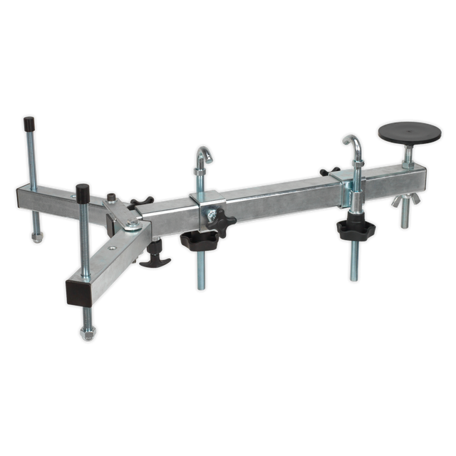 Introducing the Sealey Under Vehicle Engine/Gearbox Support - VS0110, a metal tool with a T-shaped structure, adjustable clamps, and a round black pad for stabilization, ideal for gearbox support.