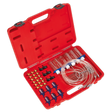 A red plastic case containing various medical or laboratory tubing and connectors, organized in designated slots, reminiscent of the precision found in the Sealey Diesel Injection Leak Back Master Kit - Bosch/Delphi/Denso (VS2048).