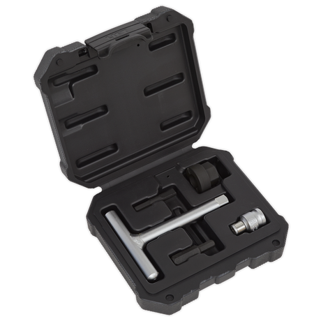 The Sealey Plastic Oil Drain Plug Driver Kit 5pc - VS673 features a black plastic case containing a silver T-bar wrench, a socket adapter, and a black round component, all securely fitted in foam cutouts. Ideal for Ford and BMW enthusiasts, it also includes slots for plastic drain bungs.