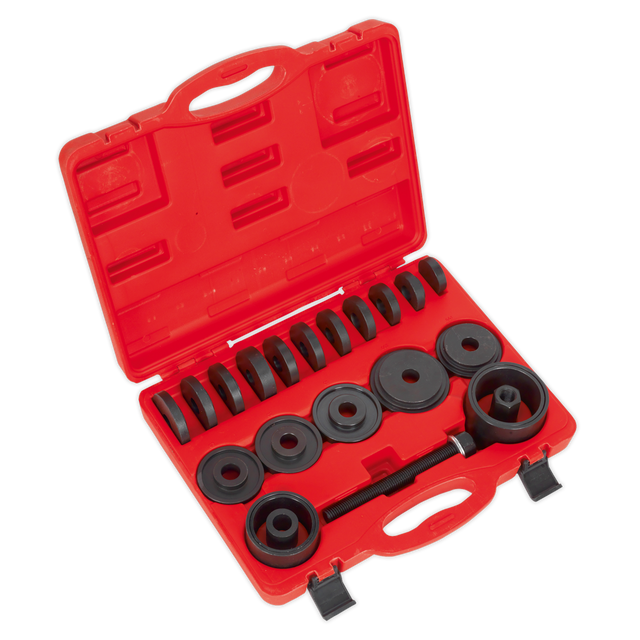 The Sealey VS7020 Wheel Bearing Removal/Installation Kit comes in a red plastic case with black cylindrical tools of various sizes, all organized neatly in fitted slots. When the case is open, it reveals all the tools and attachments needed for removing wheel bearings from front-wheel drive vehicles.