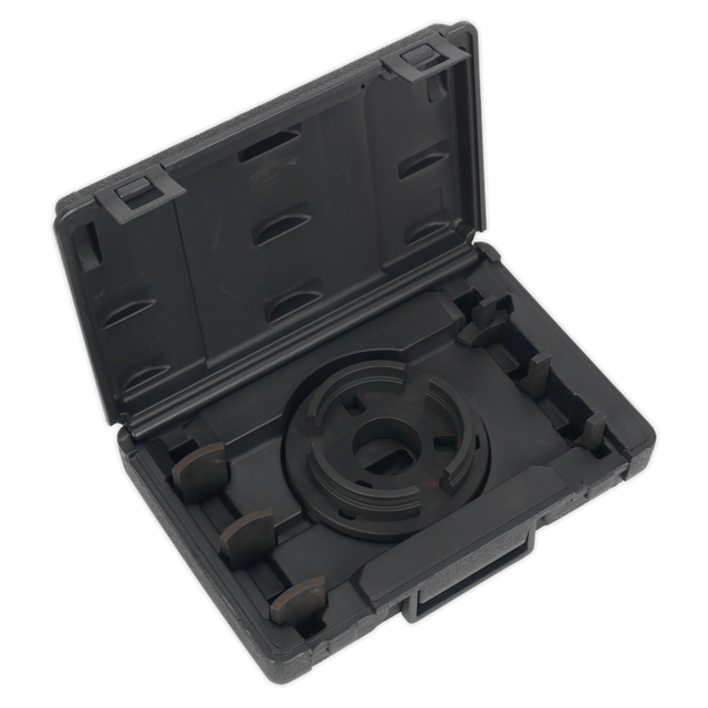 Black plastic carrying case with an open lid, revealing molded compartments designed for the Adjustable Press Support Plate - VS7037 from Sealey and wheel bearings, along with a circular component inside.