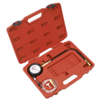 A Sealey Diesel Compression Gauge, Hose & TDC Base Kit - VSE3157, housed in a red plastic toolbox, includes an attached hose, tubing, and fittings.