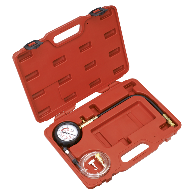 A Sealey Diesel Compression Gauge, Hose & TDC Base Kit - VSE3157, housed in a red plastic toolbox, includes an attached hose, tubing, and fittings.