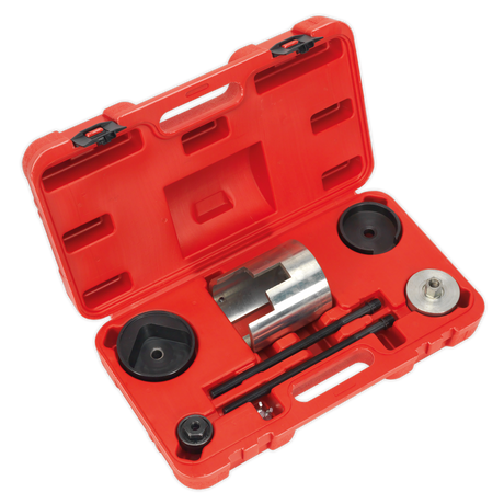 The Sealey Trailing Arm Bush Tool - Vauxhall/Opel - VSE4787 is a red plastic carrying case containing various metal and plastic components, perfect for the removal or installation of toolsets during mechanical assembly or repair tasks on Vauxhall/Opel vehicles.