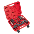 A red plastic case from Sealey containing the Petrol Engine Timing Tool Kit - for BMW 2.0 N20/N26 Chain Drive (VSE6188), which includes camshaft and crankshaft positioning tools as well as Vanos unit position tools, all arranged neatly in designated slots.