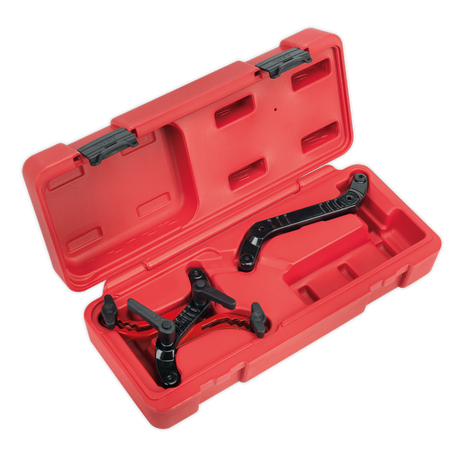 The Sealey Universal Twin Camshaft Locking Tool - VSE888 comes in a red plastic carrying case and includes a black puller tool with adjustable arms, making it perfect for mechanical use on twin camshaft diesel engines.