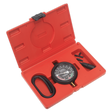 The Sealey Vacuum & Fuel Pump Pressure Test Gauge Set - VSE952 is a red plastic case containing an Ø80mm gauge, a rubber hose, and various small attachments for identifying fuel line leaks.