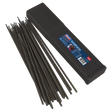 A pack of Sealey Welding Electrodes Ø3.2 x 350mm 2.5kg (WE2532) is lying next to a black plastic case with a label containing text and graphics.