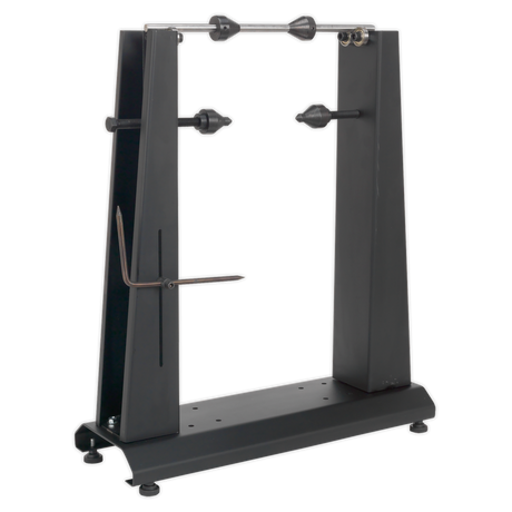 Sealey's WTS01 Motorcycle & Bicycle Wheel Balancer & Truing Stand features a sturdy black base with adjustable arms, designed to hold multiple wheels in place. It achieves precise alignment akin to professional truing stands, ensuring your wheels are securely balanced and trued.