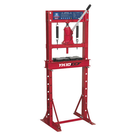 The Sealey Hydraulic Press 10 Tonne Economy Floor Type, model YK10ECF, is a red shop press that features a 10-ton capacity, a manual lever for pressing operations, and a support frame. Constructed from high-quality steel, this economy model guarantees durability and reliable performance.