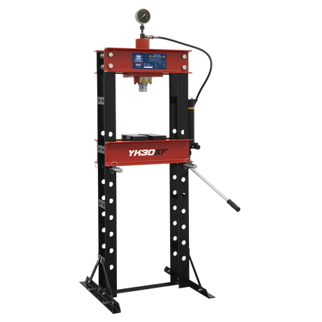 The *Sealey Hydraulic Press 30 Tonne Floor Type - YK30XF* features a red and black design with a ram pressure gauge on top and a lever on the side. Its steel frame construction is supported by perforated metal legs, and the model number YK30XF is prominently displayed on the central red part.