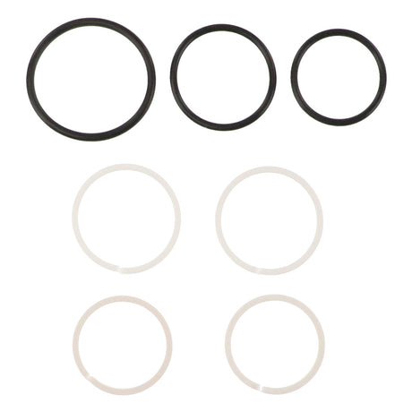 Six rubber O-rings from the AGCO SEAL KIT - AG121390 are arranged in two rows. The top row has three black O-rings in decreasing sizes from left to right, while the bottom row features three white O-rings, identical in size. No available product description information highlights the simplicity and uniformity of this design from AGCO.