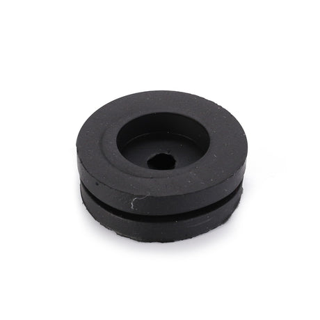 The AGCO Grommet (LA10397580) is a circular black rubber grommet featuring a central hole and a recessed groove around its edge, providing essential functionality.
