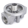 The "Fuel Filter Head Housing - 6223538M1" by AGCO is a metallic component with threaded openings, likely part of a hydraulic system or plumbing assembly.