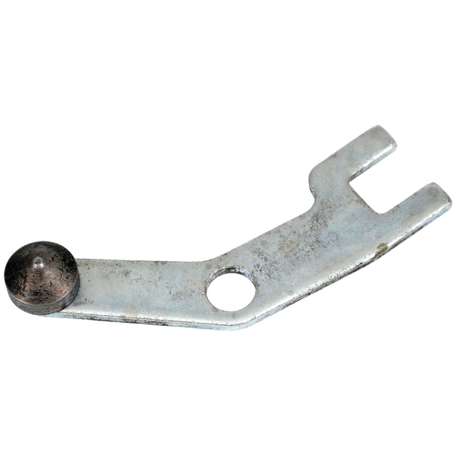 The Sparex Transmission Top Plate, part number S.108215, is a metallic lockout lever featuring a circular hole in the center, a small round raised section near one end, and an open-ended slot on the other end. It is specifically designed for Case IH Transmission Top Plate applications.