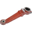 A used and worn red-painted metal mechanical lever arm with circular holes on each end matches perfectly with Sparex’s product specifications for the Hydraulic Lift Arm, part number S.108401.