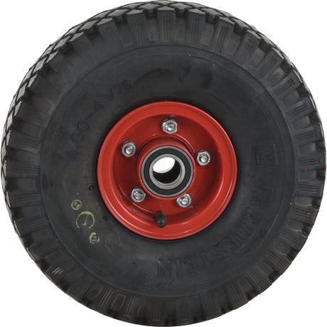 A close-up of the Sparex Complete Wheel, 4.00 - 4, 4'', 4PR, V76 Diamond - S.137656 shows a round, black rubber tire with a red metal wheel rim featuring lug nuts and a central axle hole. The tread pattern is visible along with markings such as Inner Tube S.78910 on the rubber.