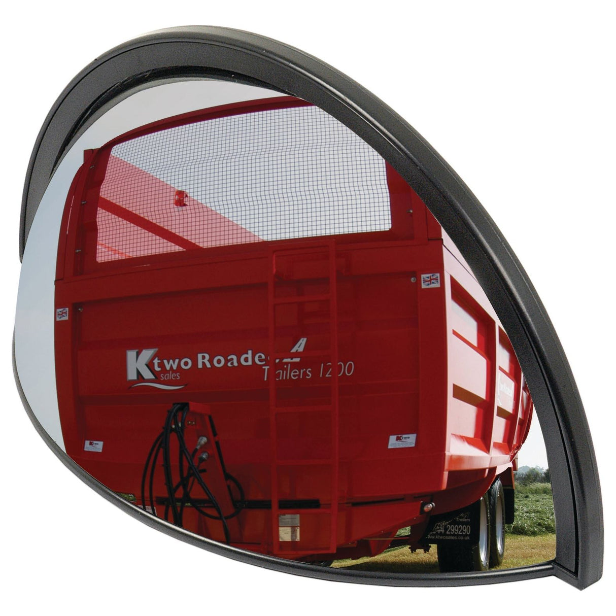 A Fish Eye Mirror, 125 x 250mm - S.23999 by Sparex reflecting the image of a red Ktwo Roadeo trailer labeled "Trailers 1220," parked on a grassy field, next to a Sparex sign.