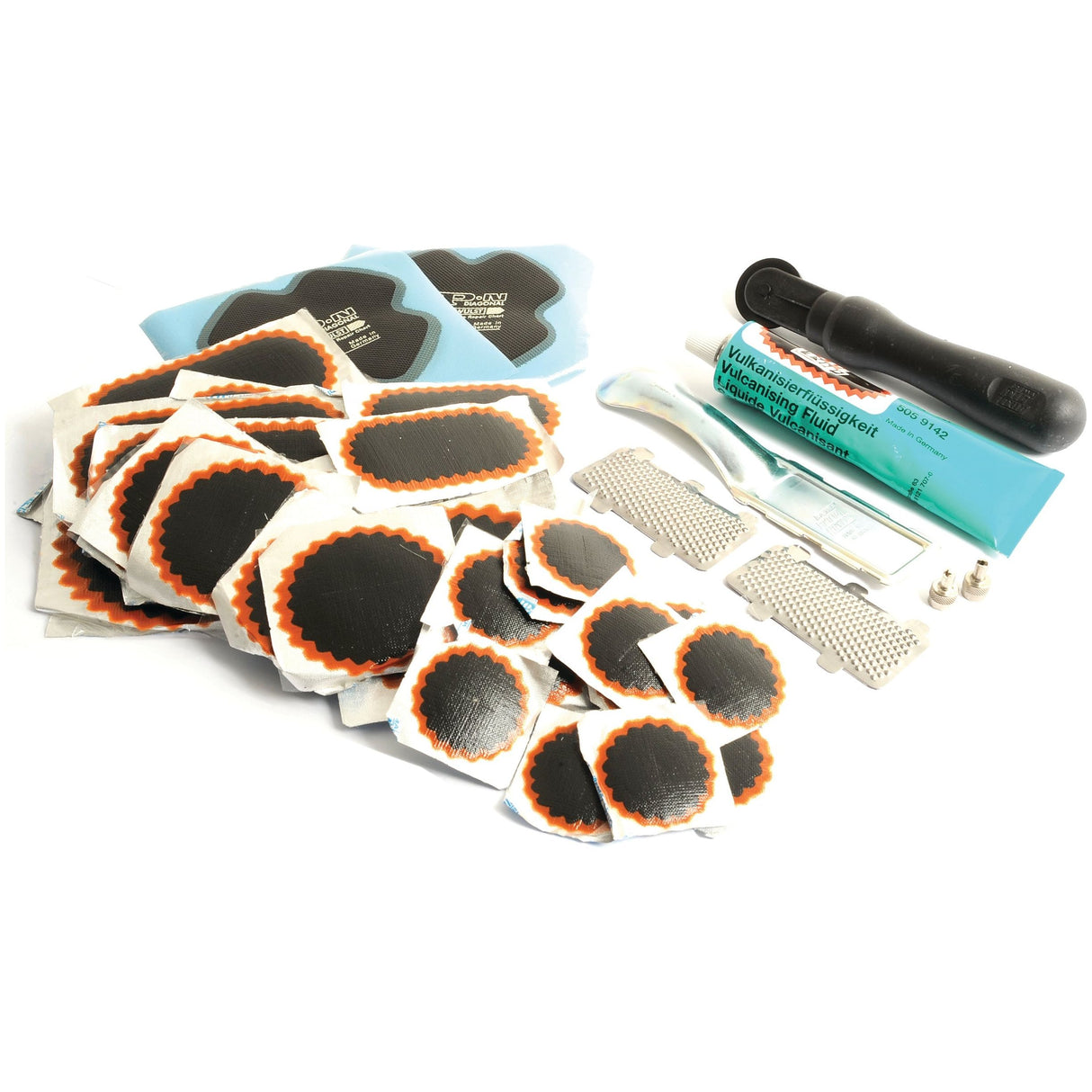 A Sparex Tyre Repair Kit TT30 (Sparex Part No. S.52214) including various tire patches, adhesive tubes, vulcanizing fluid, a rasp tool, and metal scuffers.