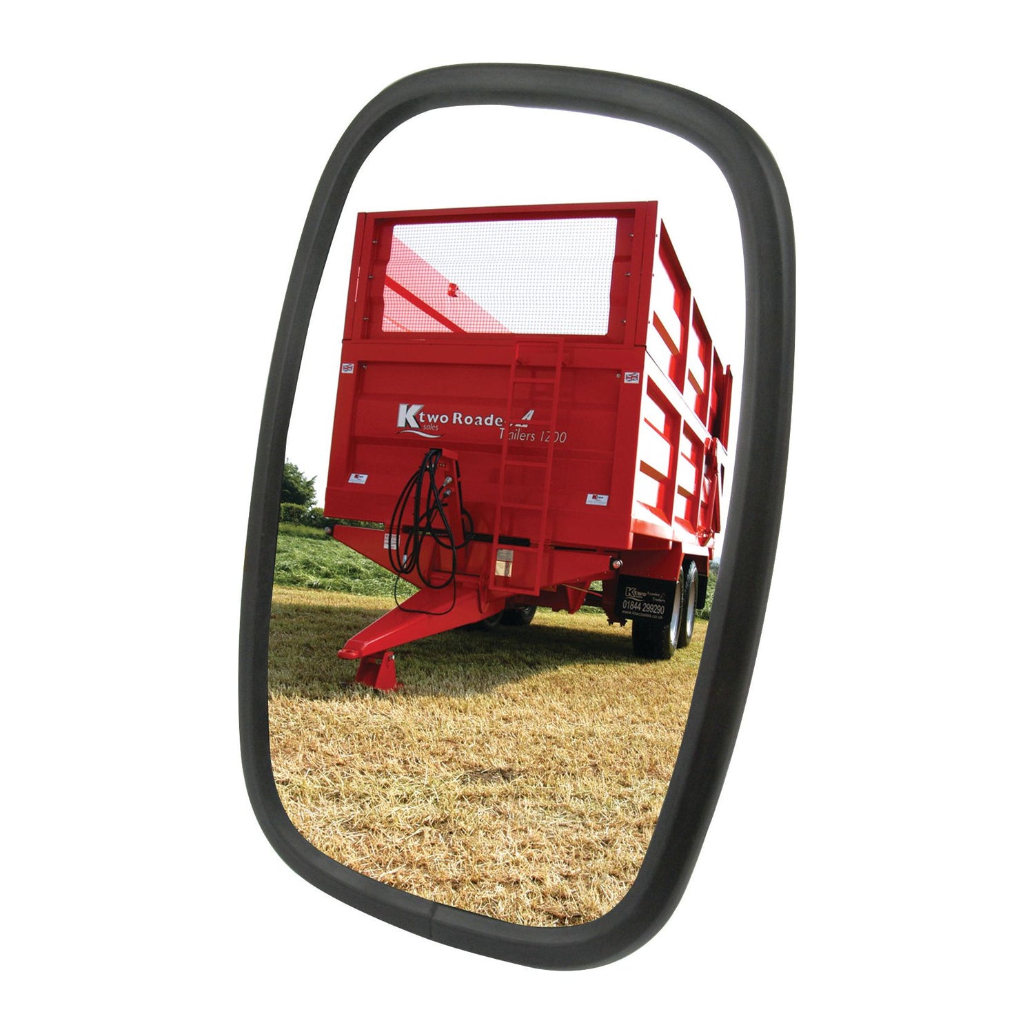 A red farming trailer on a grass field is perfectly reflected in the rectangular, flat Mirror Head from Sparex (198 x 130mm, S.6216), with its 12mm arm diameter.