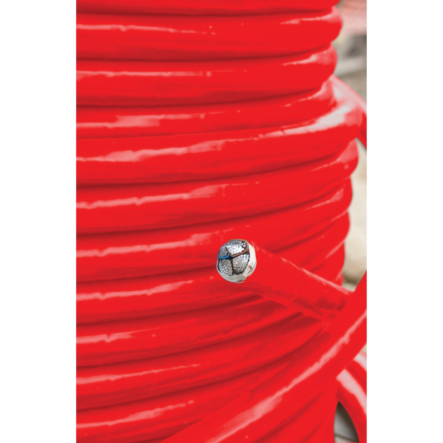 A coil of Sparex Battery Cable (25mm²) - S.127427 in red is shown with a close-up view of the cut end, revealing the inner structure.
