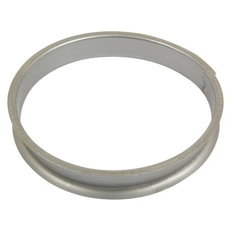 A Sparex Brush Spacer Ø178mm (7'') x 30mm, silver in color with a circular metal design and a smooth surface, reminiscent of the McConnel brush spacer, and featuring a slightly raised outer edge.