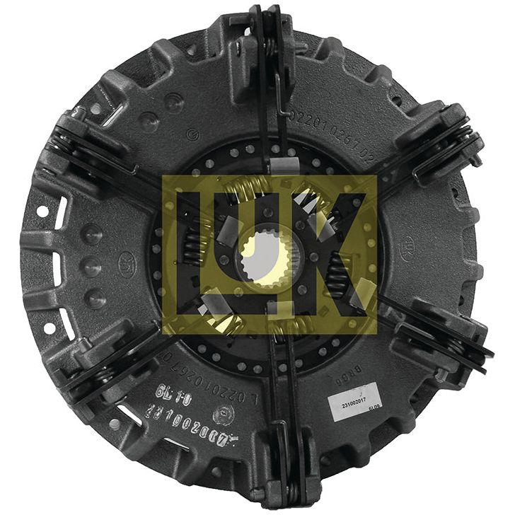 The Sparex Clutch Cover Assembly - S.131157 is a metal automotive component with visible serial numbers and the "LUK" logo in yellow, featuring a dual cover design. The part appears circular with multiple attachment points, likely intended for a cerametallic captive disc measuring 310/310mm.