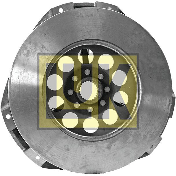 A robust Sparex Clutch Cover Assembly - S.145231 featuring a LUK cast iron housing, with circular cutouts and visible bolts arranged in a concentric pattern.