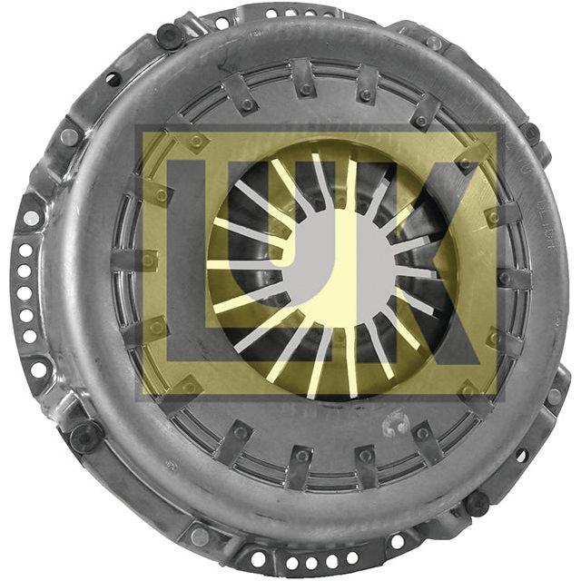 The Clutch Cover Assembly - S.145259 by Sparex features a metallic automotive clutch pressure plate with a central opening and radial spring fingers, housed in a durable pressed steel housing. The background showcases a semi-transparent "LUK" logo.