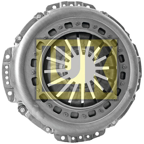 Close-up of a metallic automotive clutch pressure plate, identified as the Clutch Cover Assembly - S.145285 by Sparex. The part features a 330mm single cover, is circular with a central opening, and has multiple mounting points around its edge. A yellow and white logo is overlaid on the center, accentuating the robust design of the pressed steel housing.