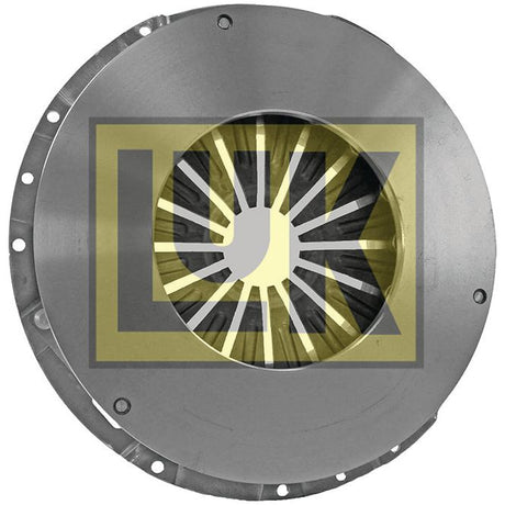 Circular metal automotive part with multiple bolts around the edge and radial slits in the center, displayed against a background featuring the Sparex logo and details of the Clutch Cover Assembly - S.145311 size.