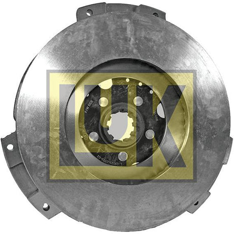 A round metal disc featuring a toothed central opening and multiple holes, prominently displaying the "LUK" logo, encased in a cast iron housing, known as the Clutch Cover Assembly - S.145356 by Sparex.