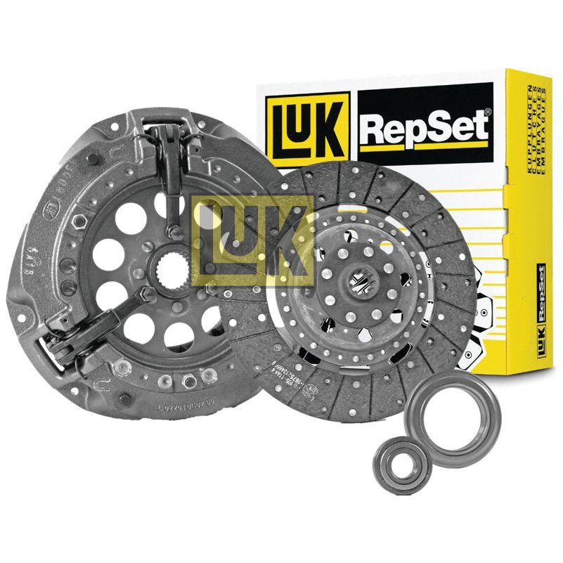A Sparex Clutch Kit with Bearings - S.127055, featuring a pressure plate, clutch disc made of organic material, release bearing, and pilot bearing, is displayed with the Sparex branded packaging in the background.