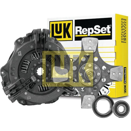 The Sparex Clutch Kit with Bearings - S.146664, featuring the pressure plate, clutch disc, and release bearings with original packaging in the background, also includes a durable cast iron housing for added reliability.