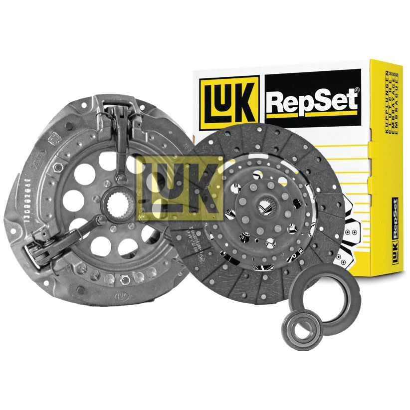 Image shows a Sparex Clutch Kit with Bearings - S.146818 with a yellow and white box in the background. The kit includes a clutch pressure plate, a clutch disc, and two bearings, designed for compatibility with various flywheel types.