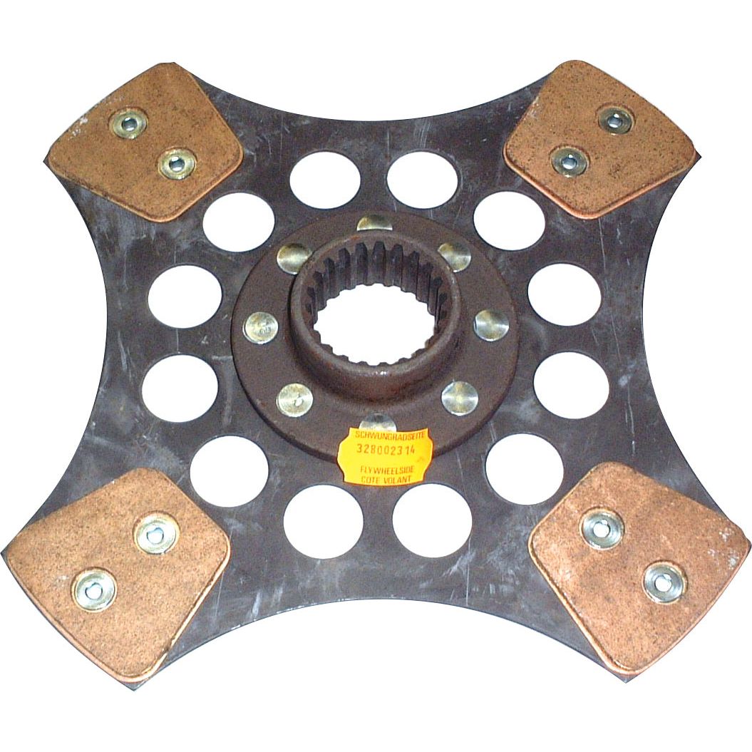 The Clutch Plate - S.145623 from Sparex is a metallic, star-shaped machine part with multiple circular holes and four copper-colored pads, each fastened by two screws. It features a yellow label with text on one side. This component has a disc size of 280mm and boasts Cerametallic Lining for enhanced durability.