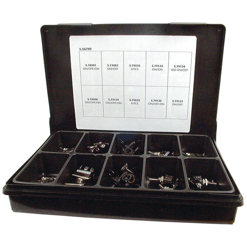 A black plastic organizer box with an open lid, displaying various small hardware parts like the Compak Toggle Switch (Sparex Part No. S.56749) in nine labeled compartments. The lid features a white chart with part numbers and descriptions from Sparex.