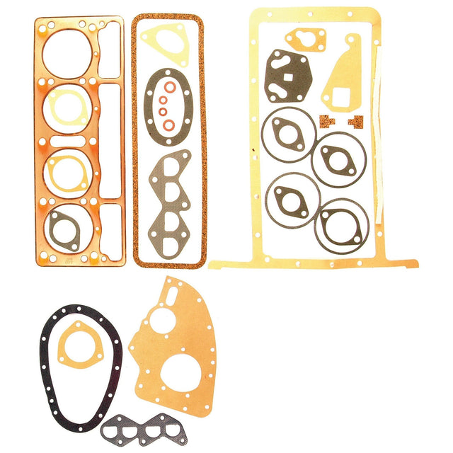 Image displaying the Complete Gasket Set - 4 Cyl., Sparex Part No.S.42486, designed for Massey Ferguson petrol engines, arranged on a white background. The components include gaskets with multiple circular and oval cutouts, some specifically designed for 87mm configurations.