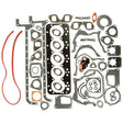 A complete gasket set for a Fiat 90-90, featuring an array of seals and gaskets tailored for a 5-cylinder engine, elegantly spread out on a white background. This is the Sparex Complete Gasket Set - 5 Cyl. (8055.04, 8055.05) | Sparex Part No.S.62107