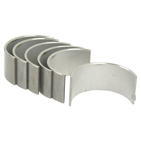 A Sparex Conrod Bearing +0.040'' (1mm) Set (Sparex Part No.S.42079), featuring five silver metal half-circle engine bearings compatible with Massey Ferguson tractors, arranged in a slightly curved line.