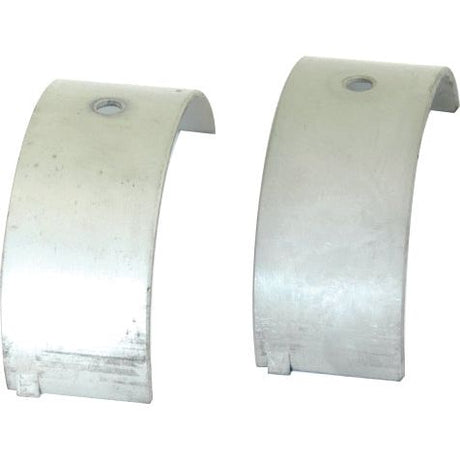 Two metallic bearing shell halves, each with a central hole, placed against a plain background – essential components compatible with Fiat tractor parts. These are the Conrod Bearing Std. Pair from Sparex, Part No. S.62043.