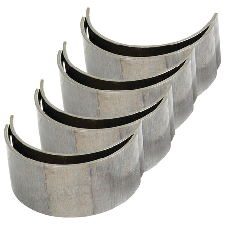 A set of six curved metal engine bearings, arranged in a slightly staggered formation, suitable for Case IH machinery is available as the Conrod Bearing Std. Set by Sparex (Part No. S.57639).