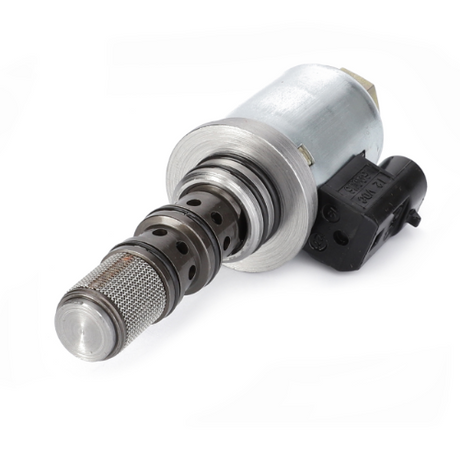 A close-up image reveals the AGCO Massey Ferguson Electrovalve 3794721M5, featuring a metallic body and a mesh filter at one end, seamlessly integrated into what appears to be the advanced hydraulic system of a DYNA 4 tractor, connected to a black electrical component.