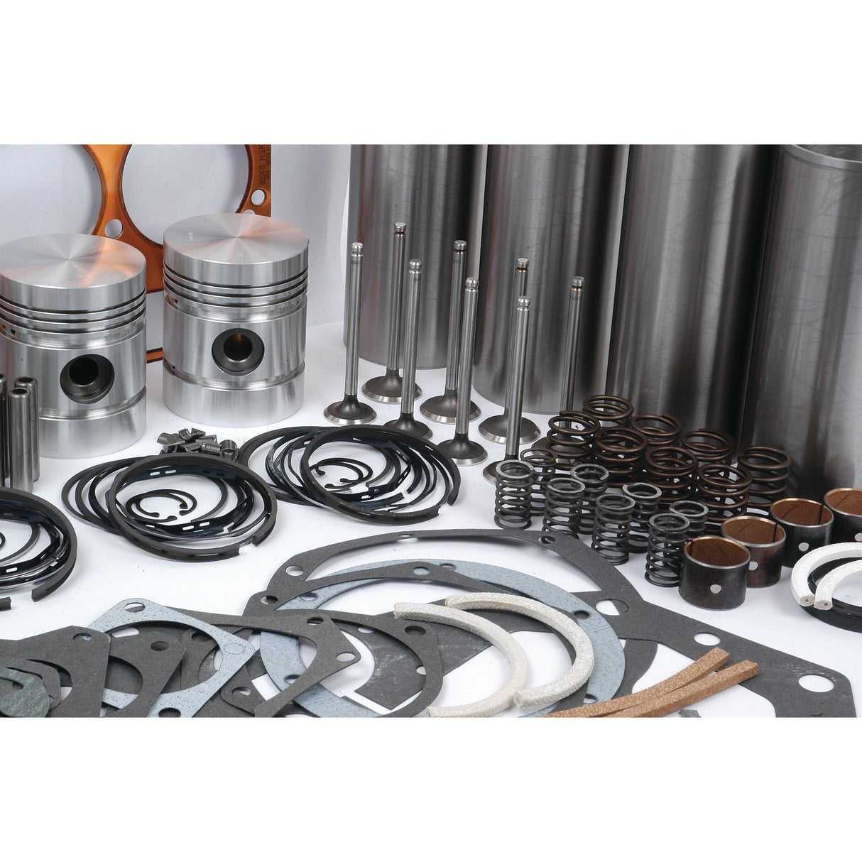 A collection of automotive engine components, including pistons, valves, gaskets, seals, and various metal rings for the Sparex Engine Overhaul Kit with Valve Train (Finished) - S.40371, arranged neatly on a white background.