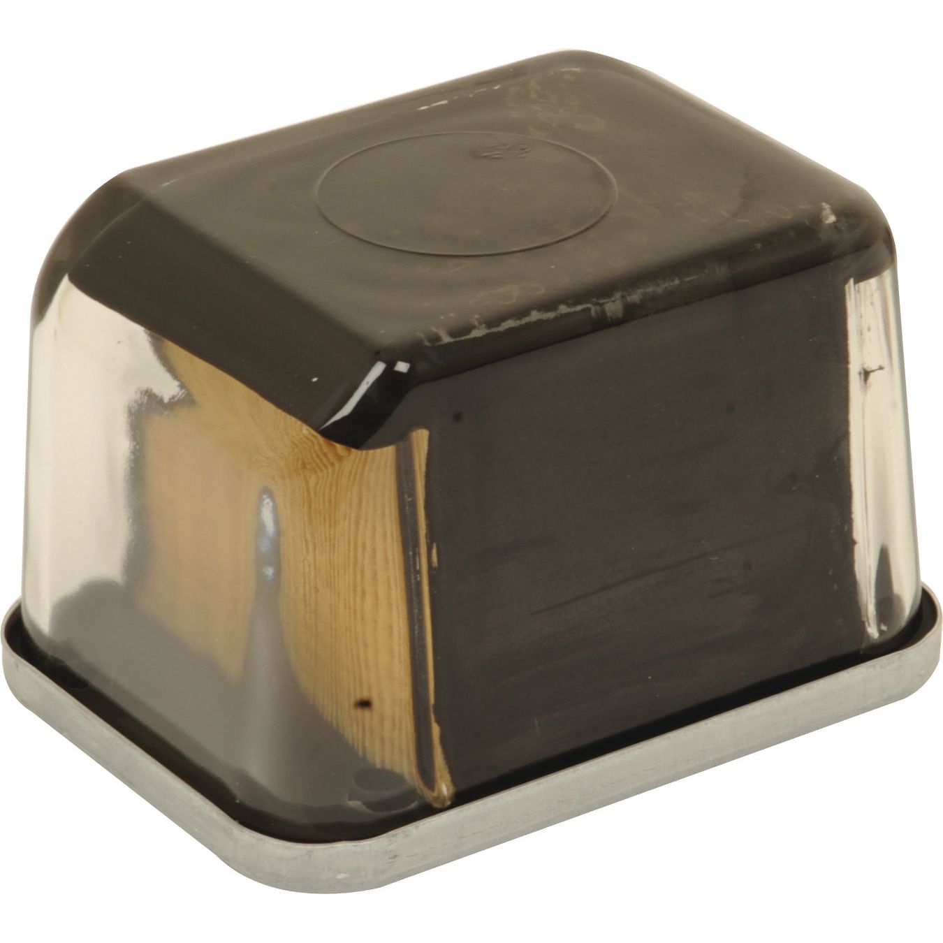 A Sparex Fuel Filter - Element - FF203 (Sparex Part No. S.109035) is a gray and black plastic cover with a rectangular shape and rounded edges, designed to fit seamlessly over Fleetguard or John Deere fuel filters.