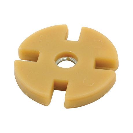 The Fuel Injector Pump Drive Pad (Sparex Part No. S.66550) by Sparex is a circular, tan plastic pad featuring four equally spaced notches and a central hole, designed for compatibility with Fuel Injector Pump systems on Ford New Holland machinery.