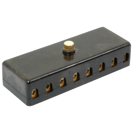 Rectangular, black Screw Terminal Fuse Box from Sparex with eight terminal openings on one side and a golden adjustment screw on the top (Sparex Part No. S.5070).