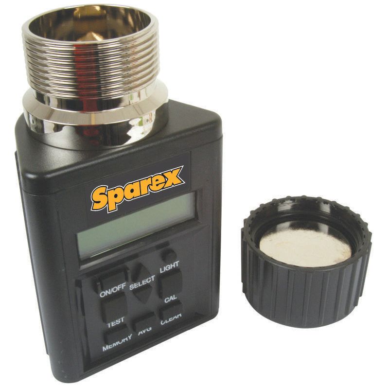 A black digital device labeled "Sparex," identified as the Grain Moisture Tester and Scale Kit - S.24640, features a display screen and buttons. It is positioned next to a detached cylindrical cap with a threaded metal interior.