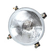Close-up of a round, clear automotive headlight featuring a reflective surface and mounting screws at the edges, equipped with a powerful Sparex Head Light, (Halogen), RH & LH, RH Dip, 12V - S.66149.